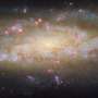 Imagine Hubble observa o galaxie plina de mistere